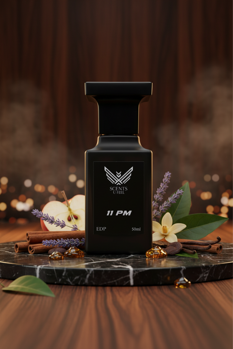 Black perfume bottle labeled '11 PM' by Scents of Evil on a white background